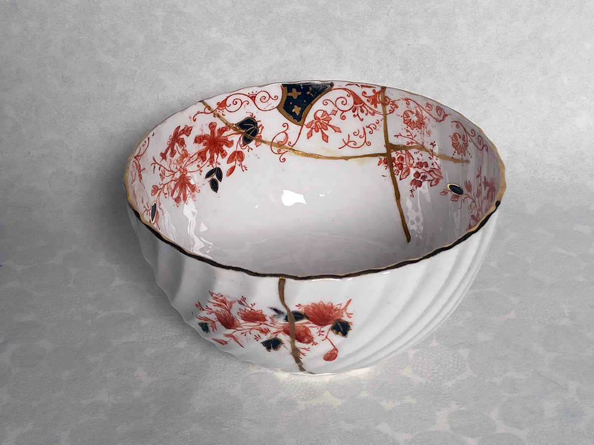 Medium white bowl with red and black floral pattern