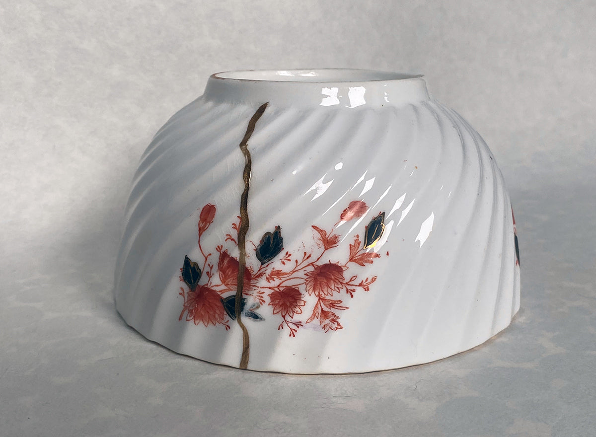 Medium white bowl with red and black floral pattern